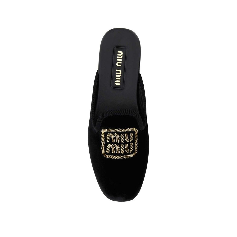 Miu Miu – Mules en cuir effet velours avec logo brodé