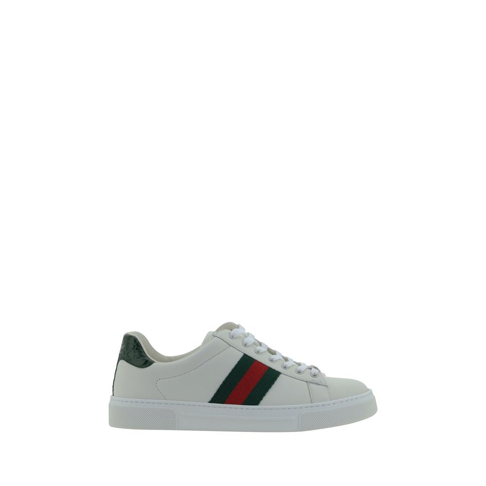 Gucci — Sneakers basses blanches en cuir de veau avec bandes Web iconiques
