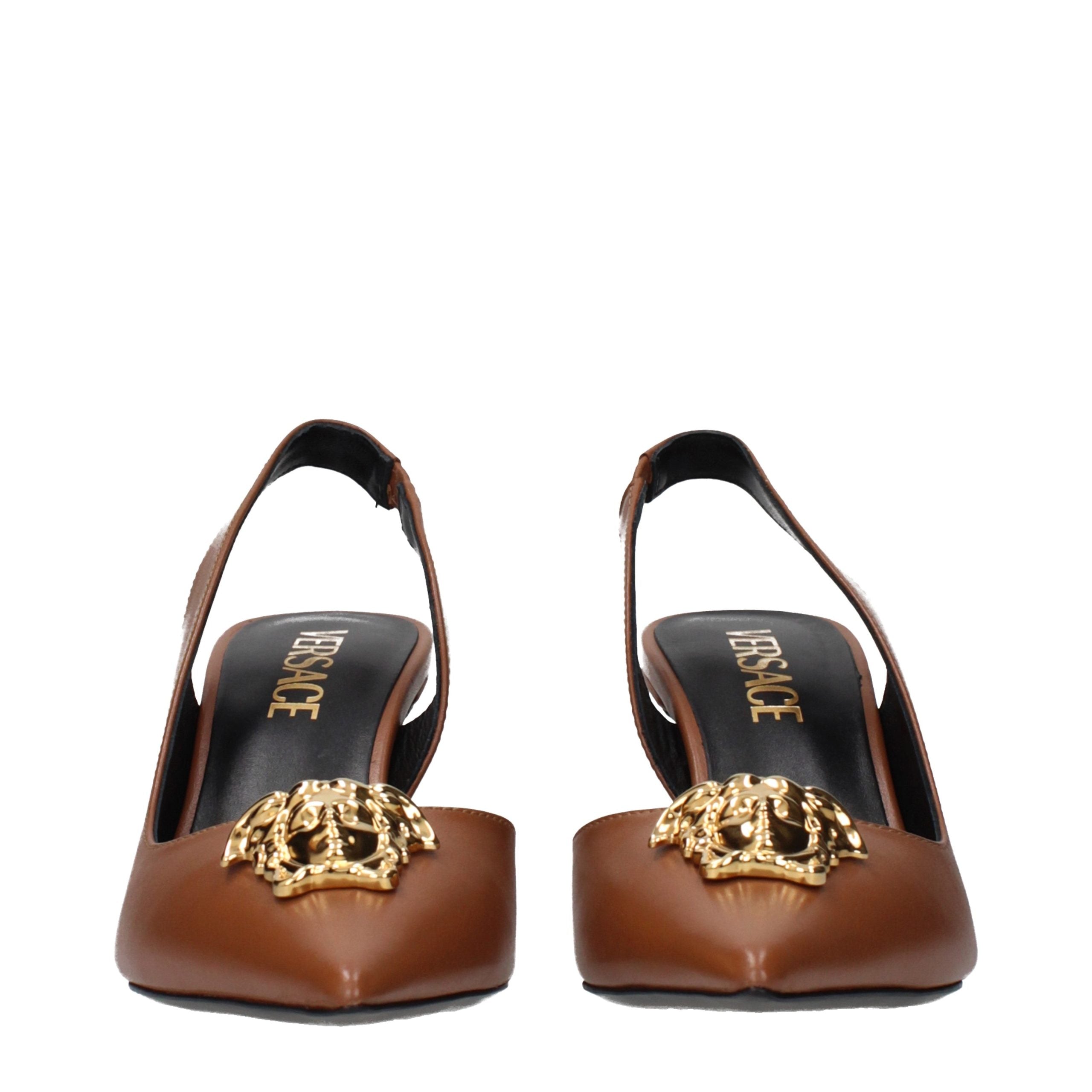 Versace – Sandales en cuir brun avec détail signature