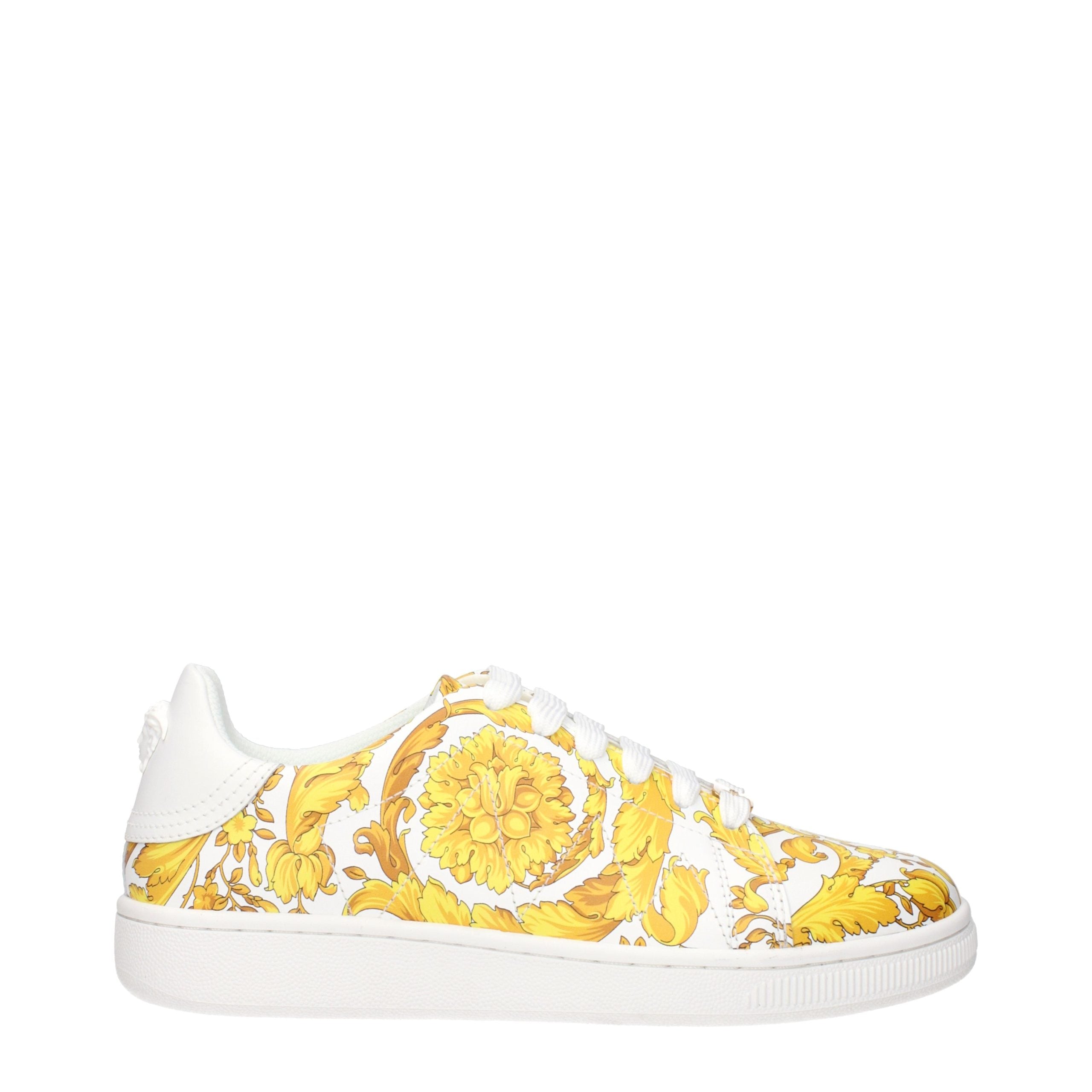 Versace – Sneakers en cuir blanc avec détails signature