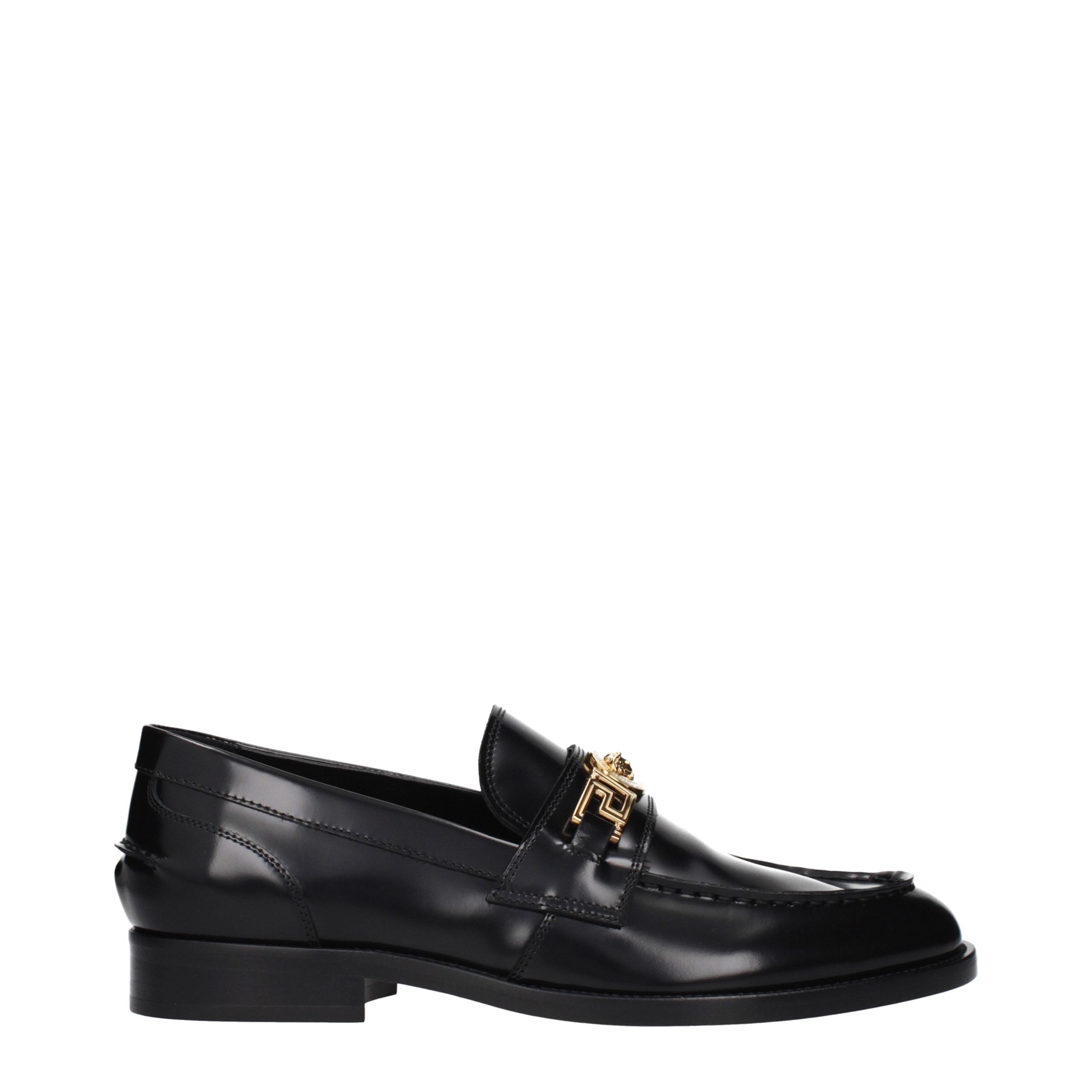 Versace – Loafers en cuir noir avec détail signature