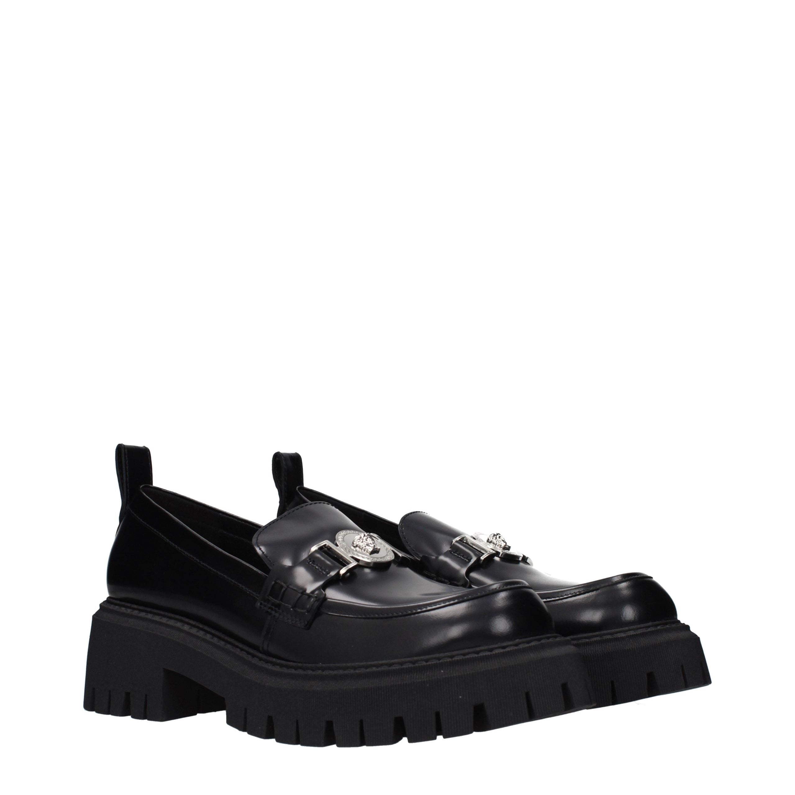 Versace – Loafers en cuir noir avec détail frontal
