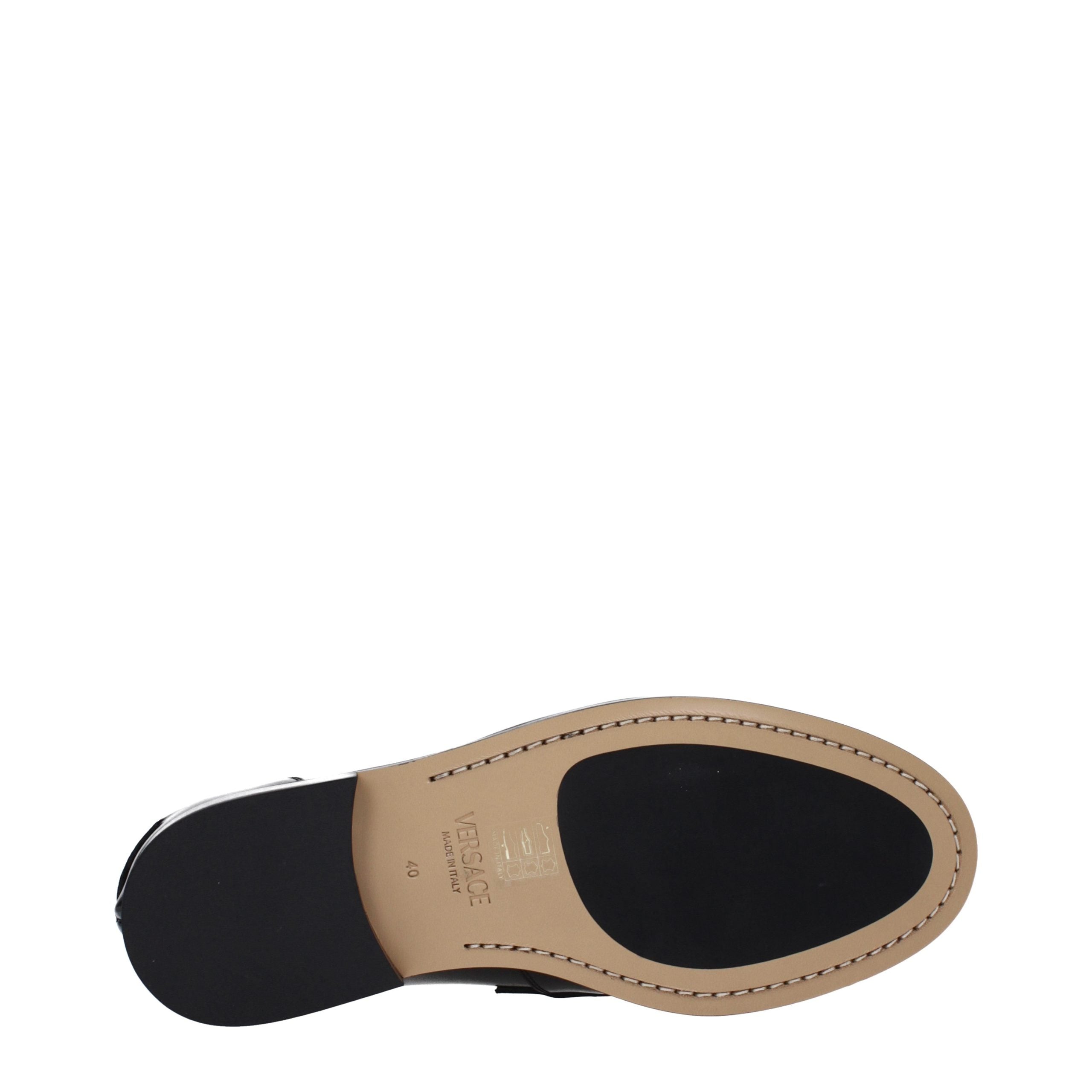 Versace – Loafers en cuir noir avec détail signature