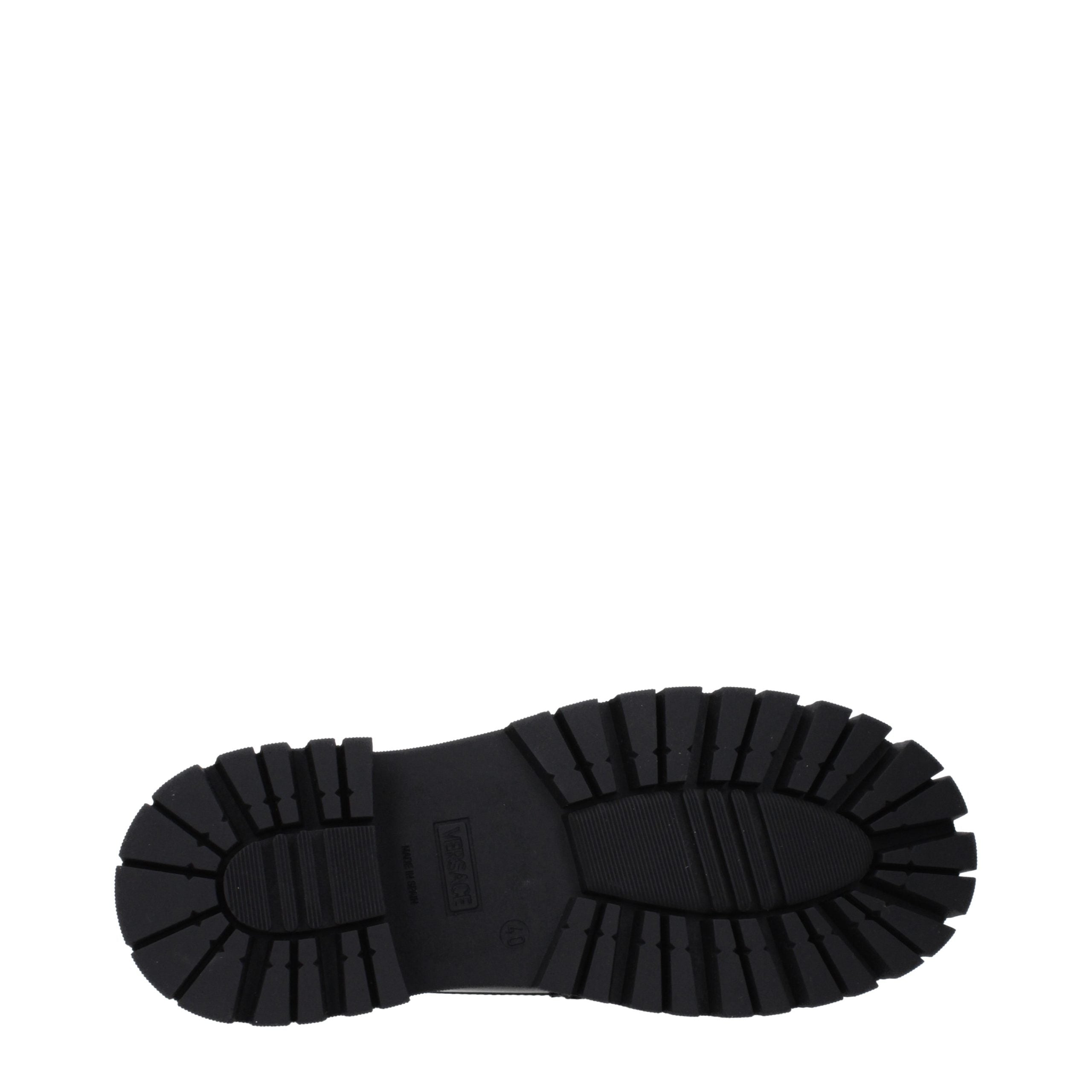 Versace – Loafers en cuir noir avec détail frontal
