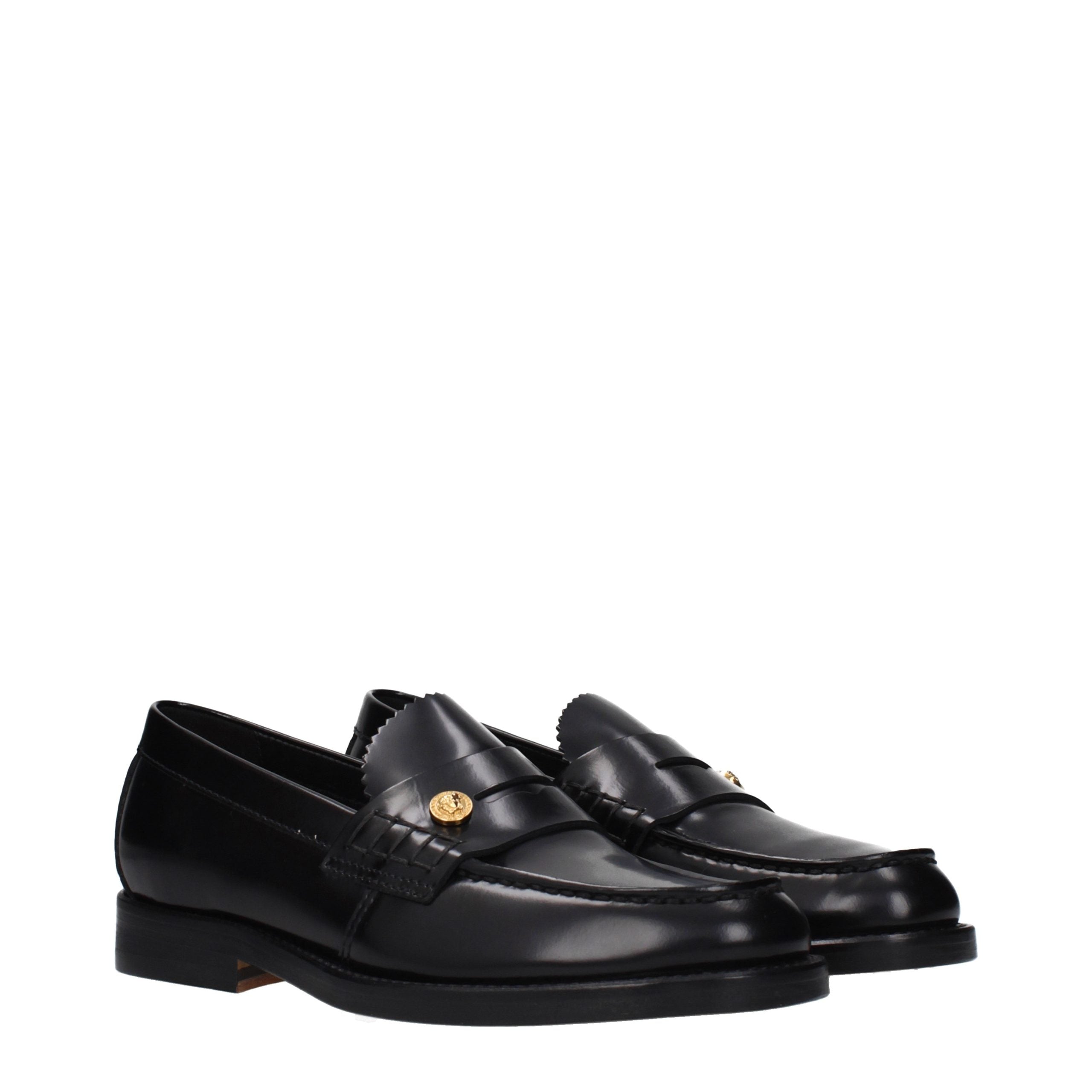 Versace – Loafers en cuir noir avec détail latéral