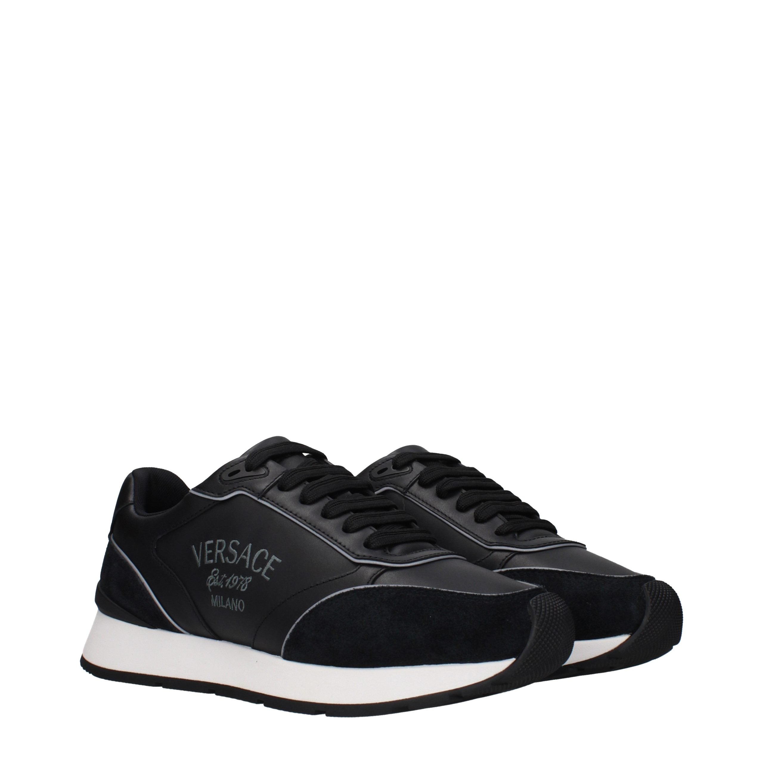 Versace – Sneakers en cuir noir avec logos signature