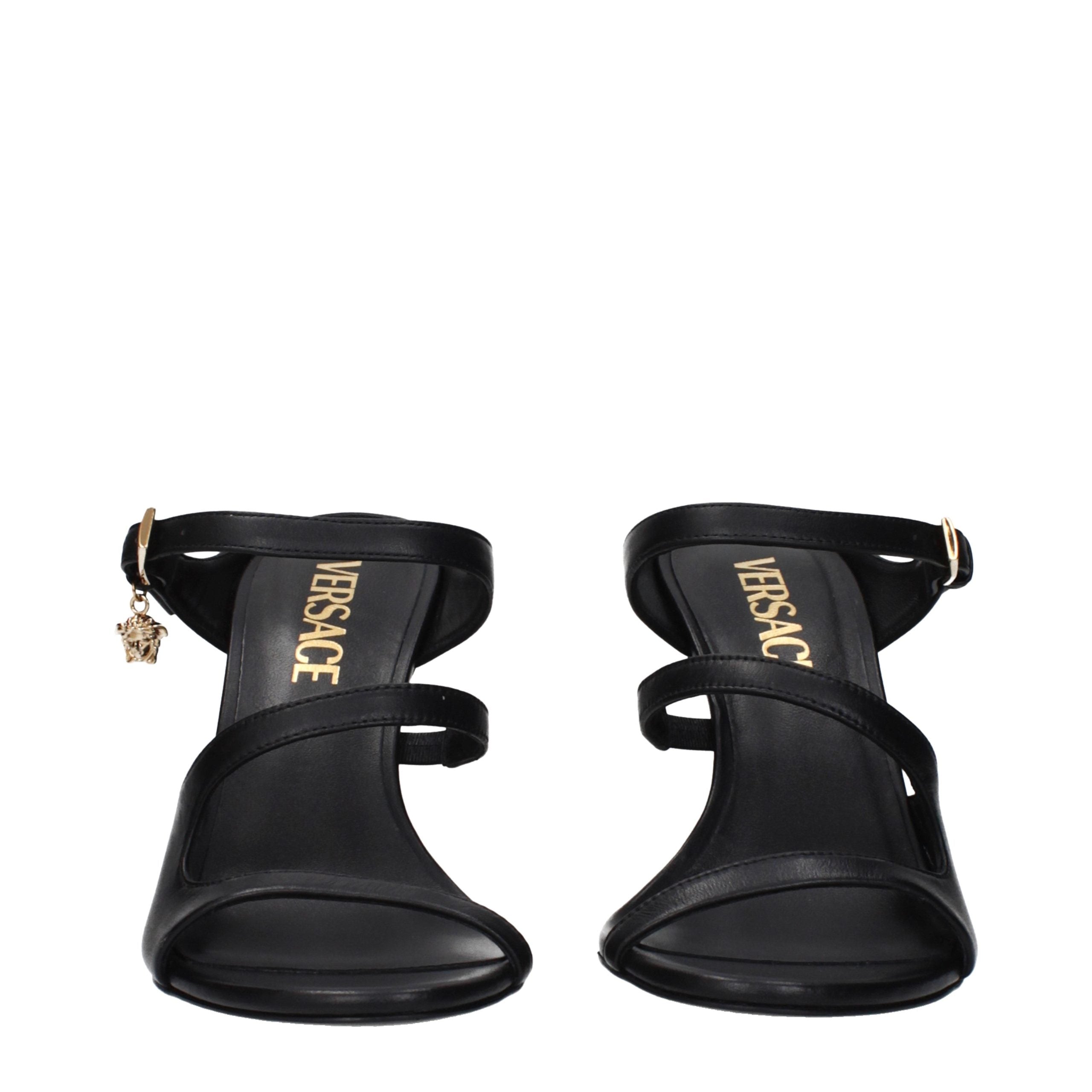 Versace – Sandales en cuir noir avec logo latéral