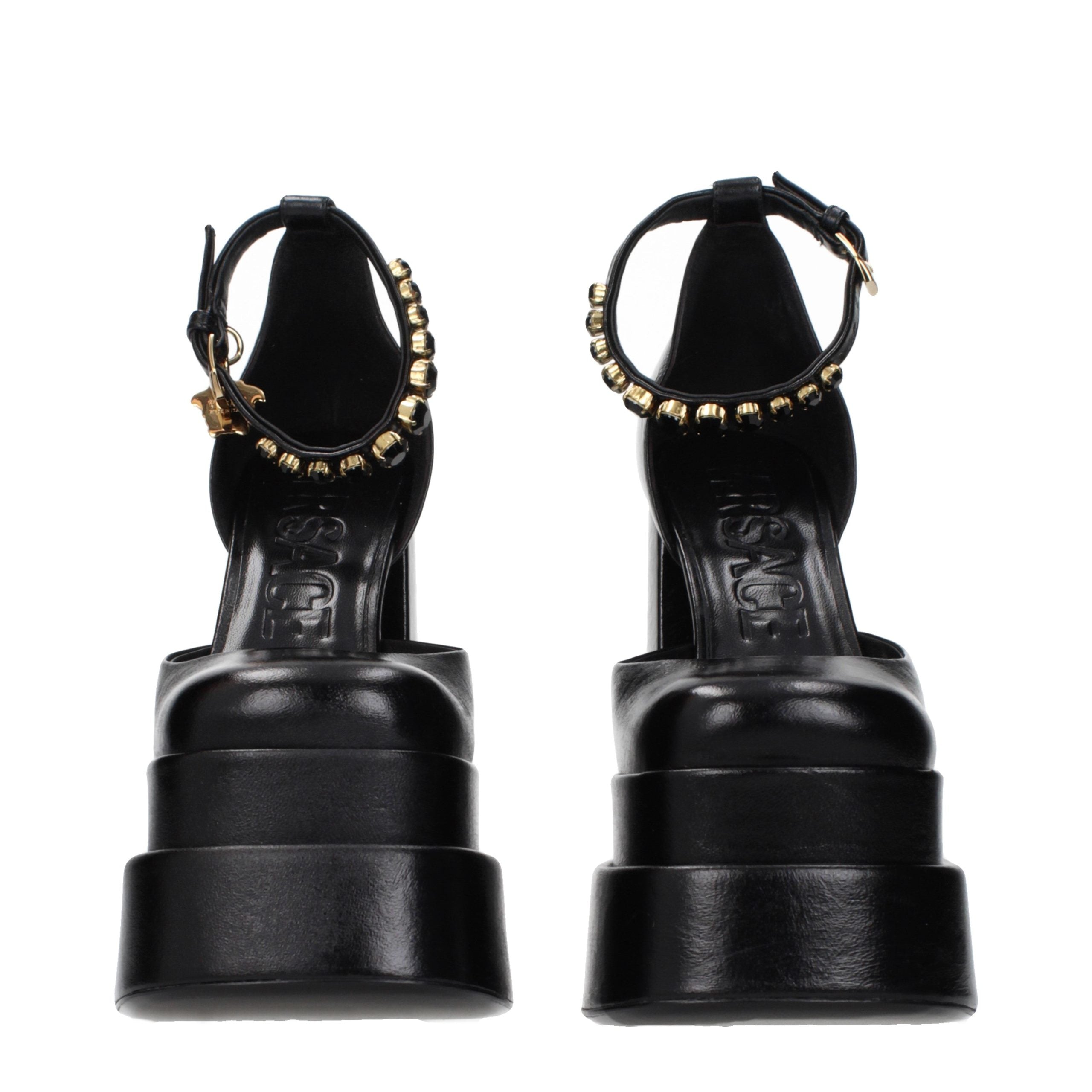 Versace – Sandales en cuir noir avec détails décoratifs