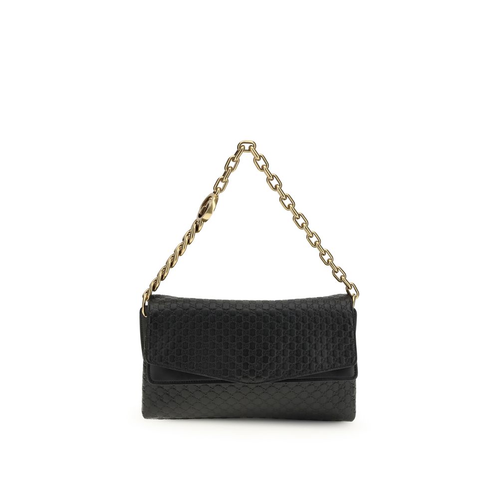 Gucci – Sac porté épaule medium à chaîne en cuir GG embossé