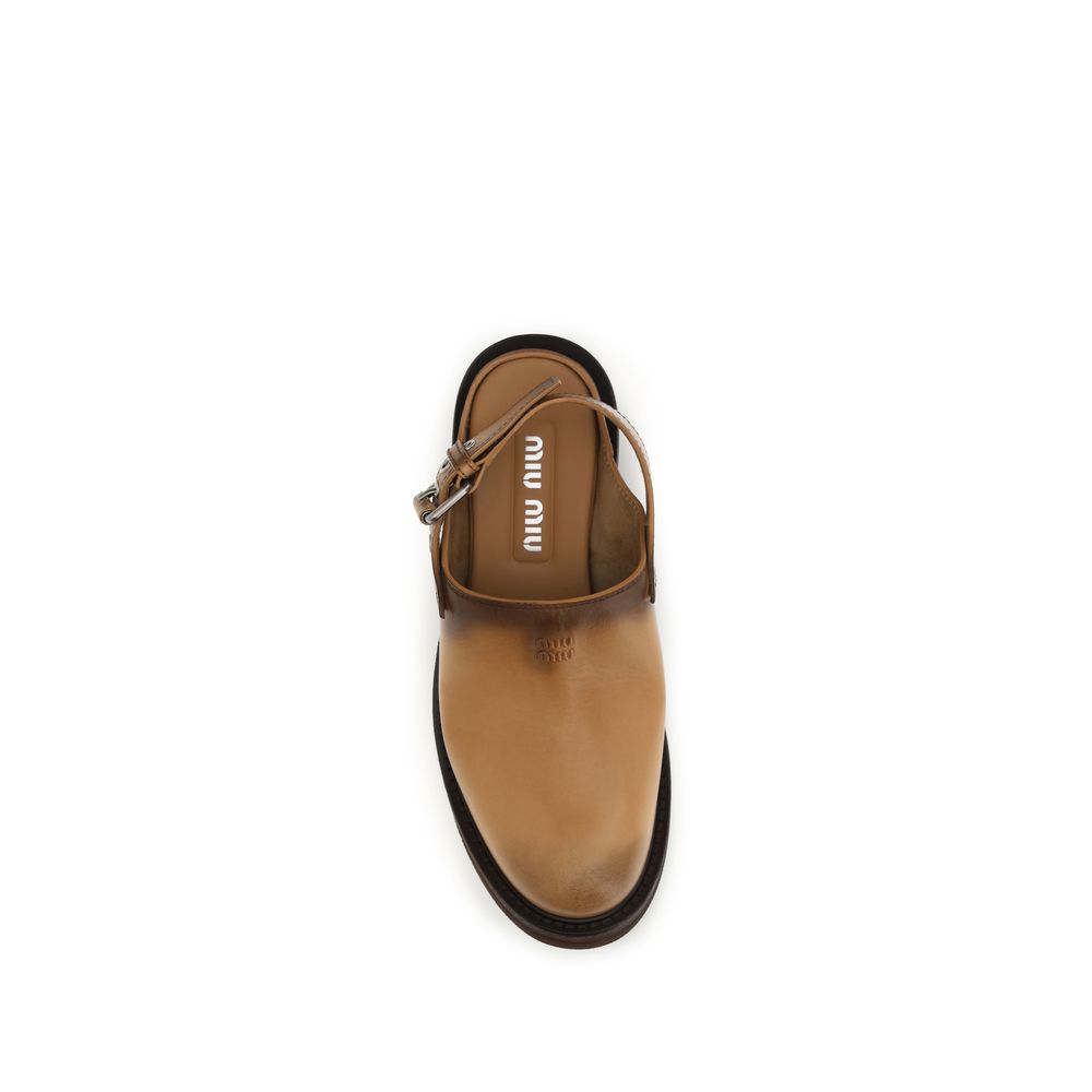 Miu Miu – Mules en cuir de veau marron effet vieilli