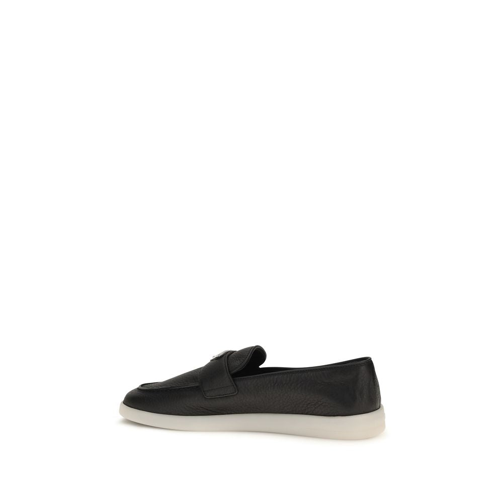 Prada – Loafers en suède avec triangle émaillé