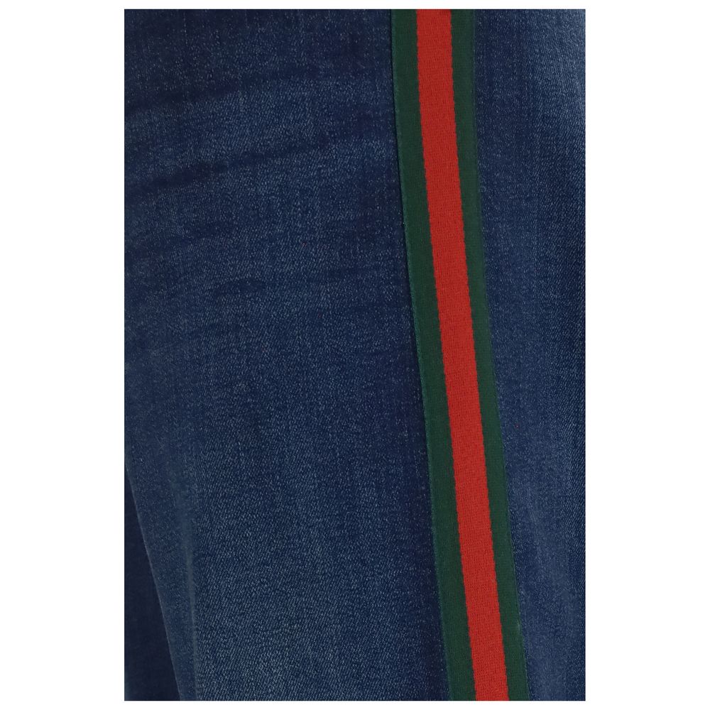 Gucci – Jean flare en coton avec bande Web