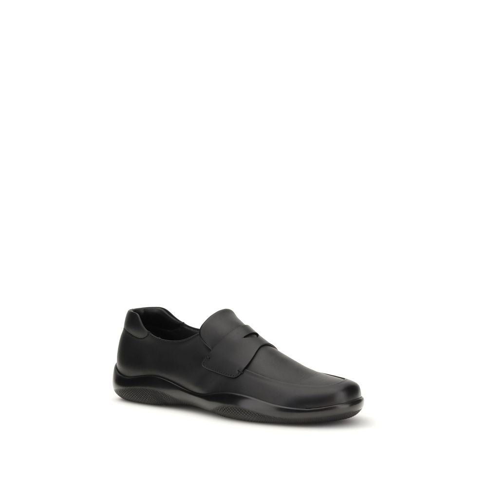 Prada – Mocassins Toblach en cuir avec semelle gomme
