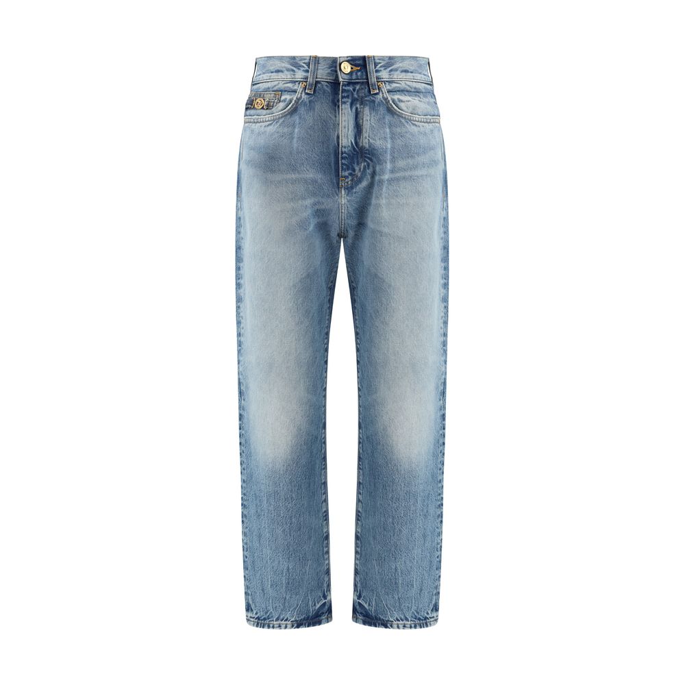 Versace — Jean en denim bleu effet usé avec emblème Medusa Biggie