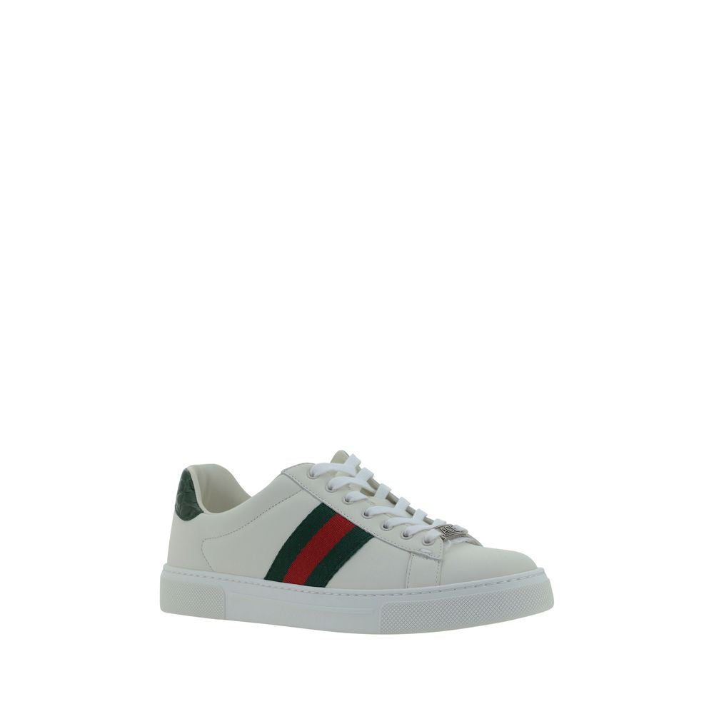 Gucci — Sneakers basses blanches en cuir de veau avec bandes Web iconiques