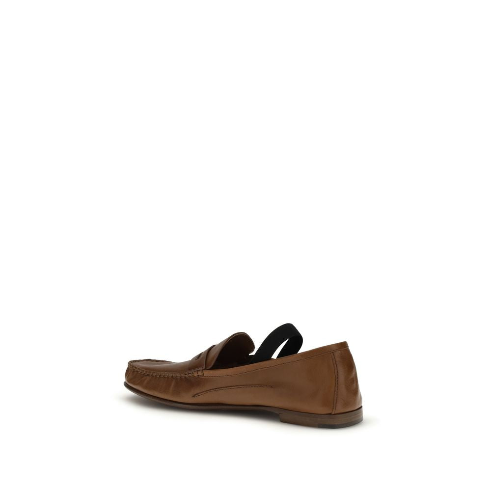 Versace – Loafers en cuir effet vintage avec Medusa