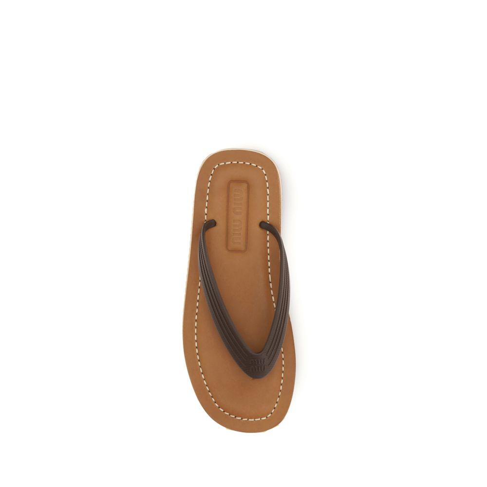 Miu Miu – Sandales flip-flop en cuir