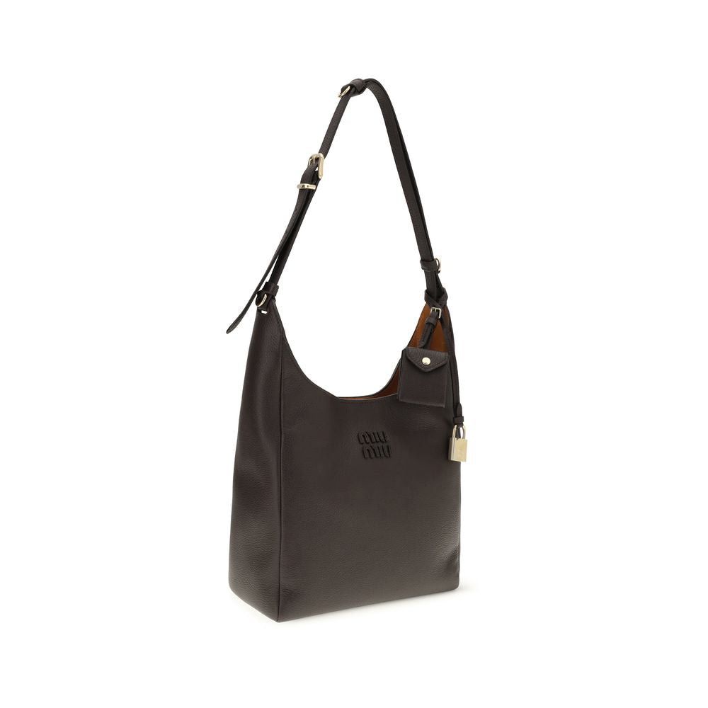 Miu Miu — Sac bucket en cuir martelé marron