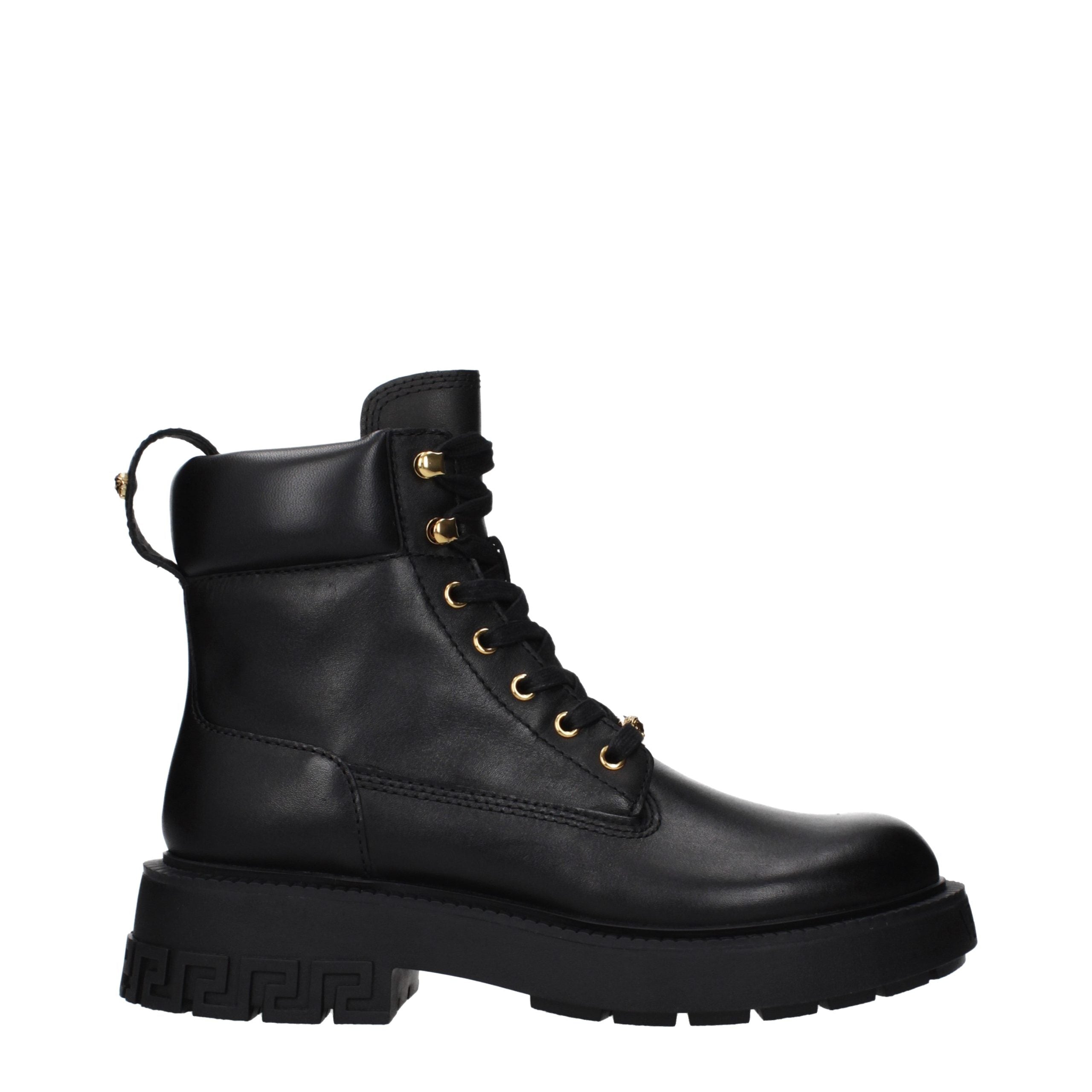 Versace – Bottines en cuir noir avec détails signature