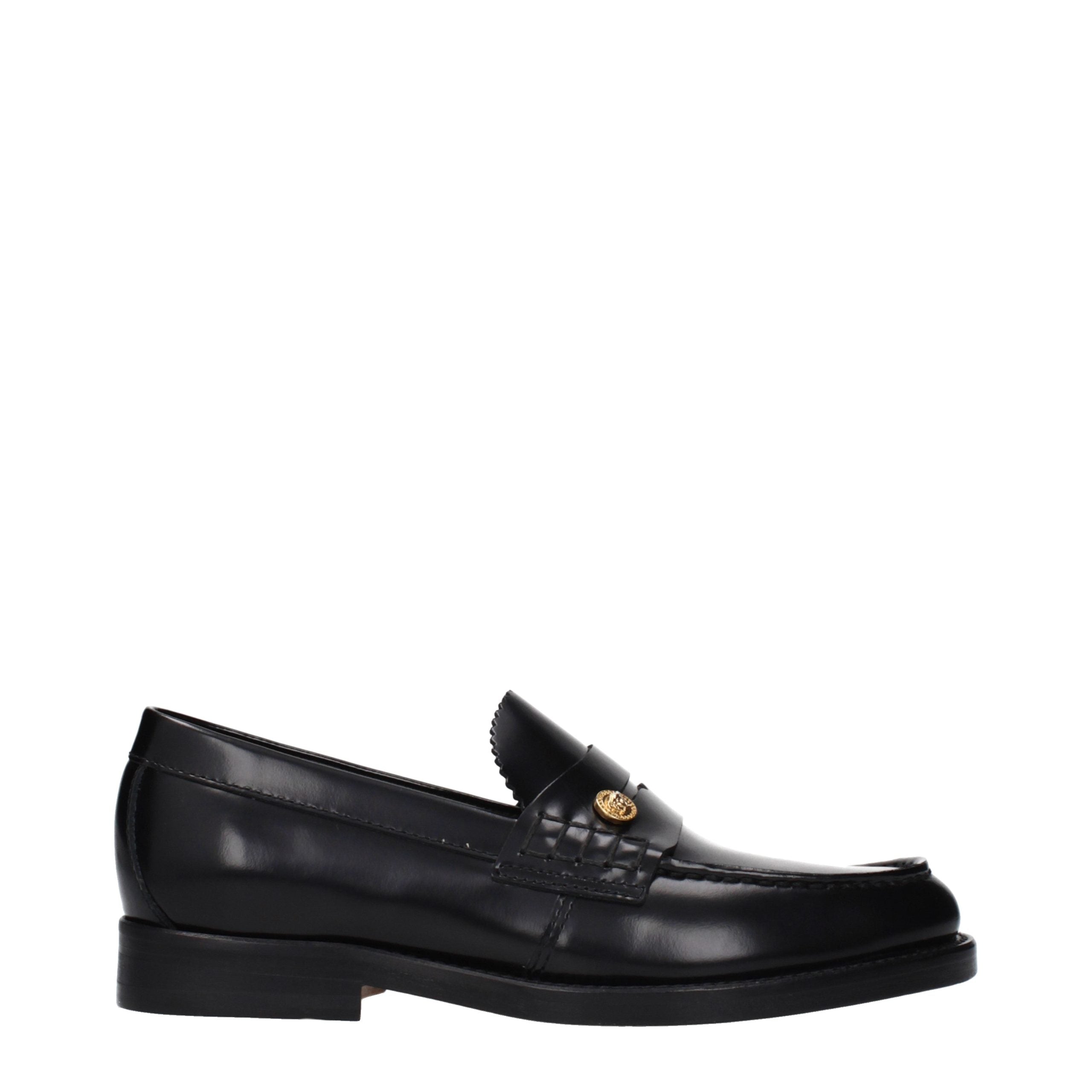 Versace – Loafers en cuir noir avec détail latéral