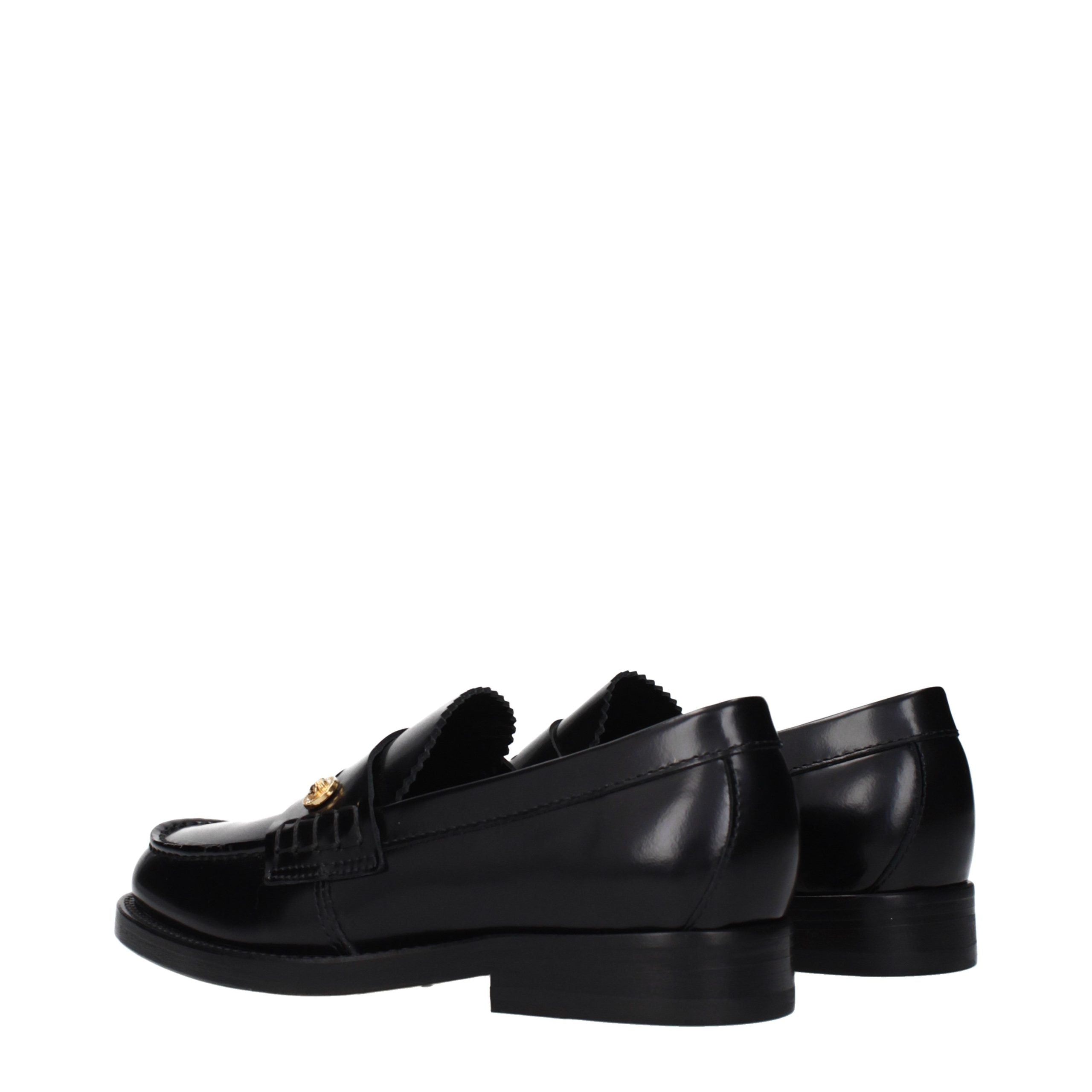 Versace – Loafers en cuir noir avec détail latéral