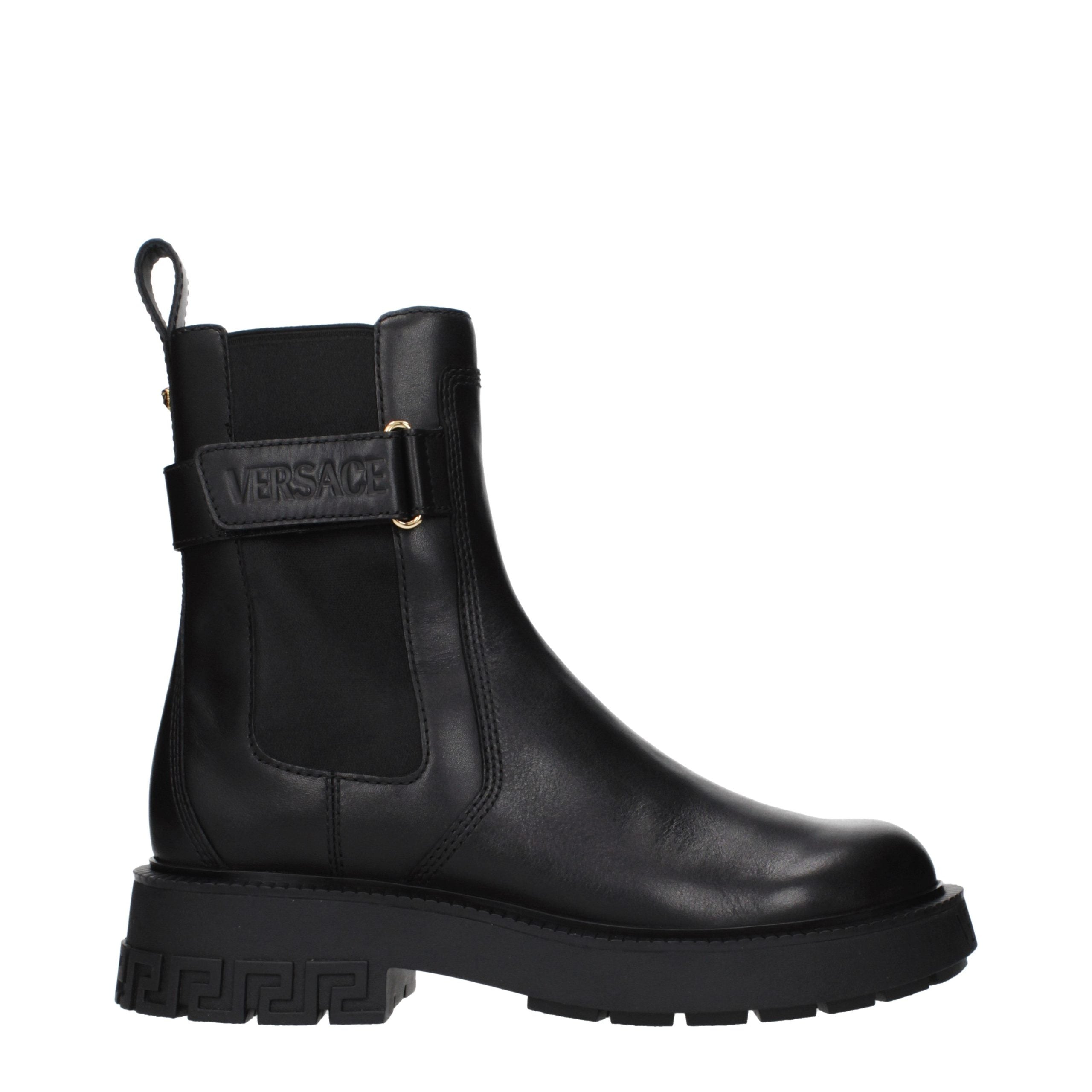 Versace – Bottines en cuir noir avec détails logo