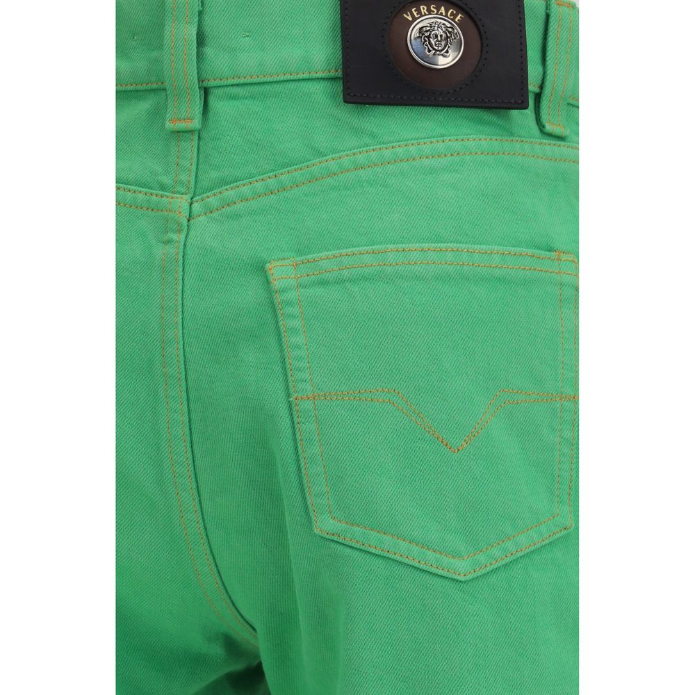 Versace – Jean cropped en denim avec détail Medusa