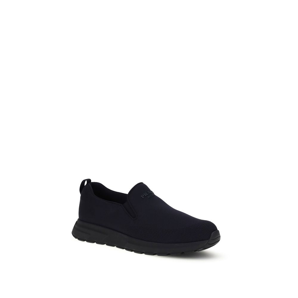Prada – Sneakers slip-on en jersey avec logo rubberisé