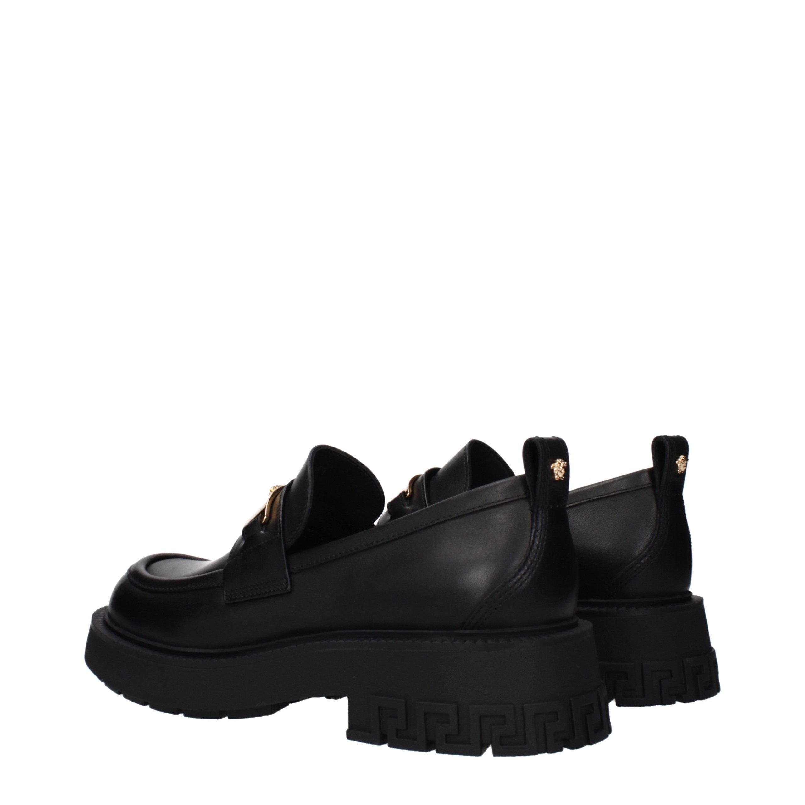 Versace – Mocassins en cuir noir avec détails signature