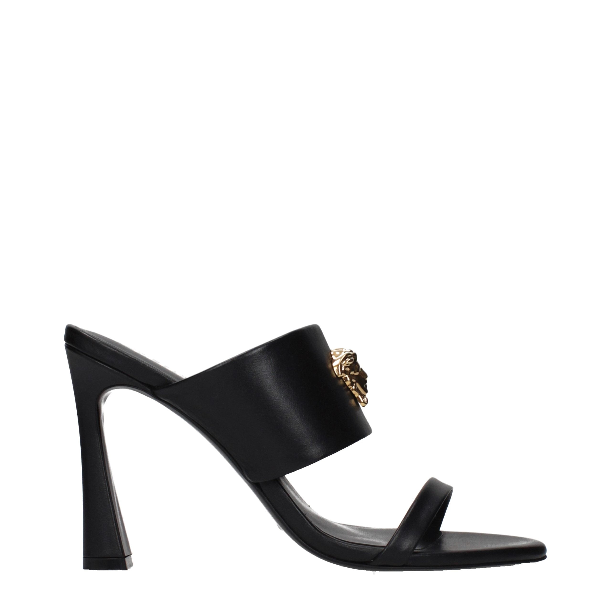 Versace – Sandales en cuir noir avec détail frontal