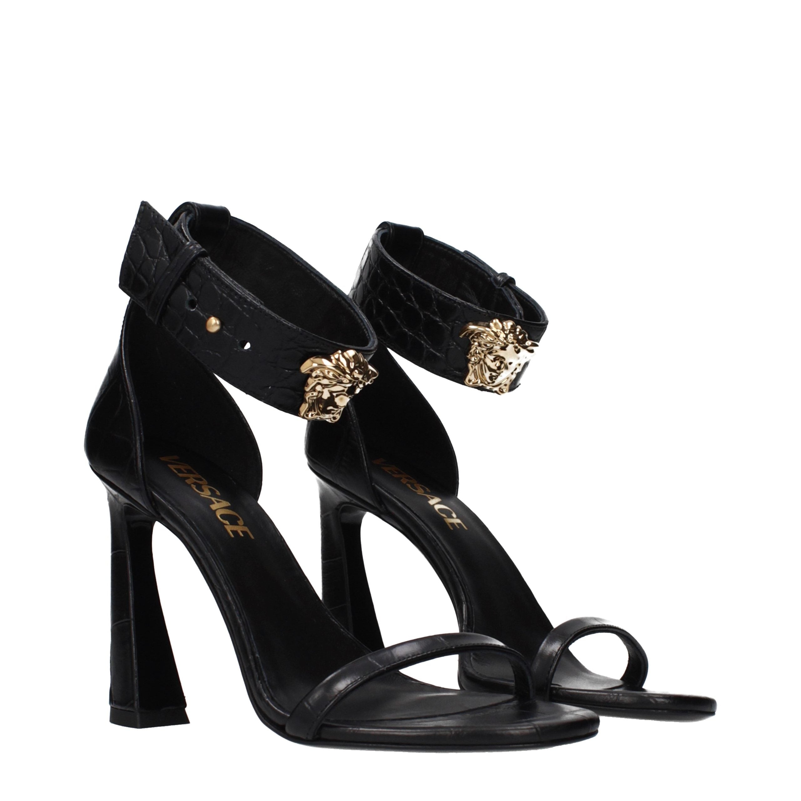 Versace – Sandales en cuir noir avec détail latéral
