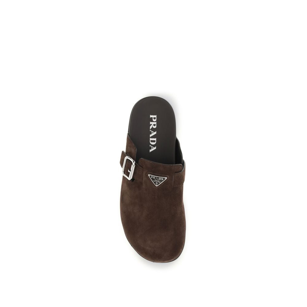 Prada – Mules en suède avec logo triangle