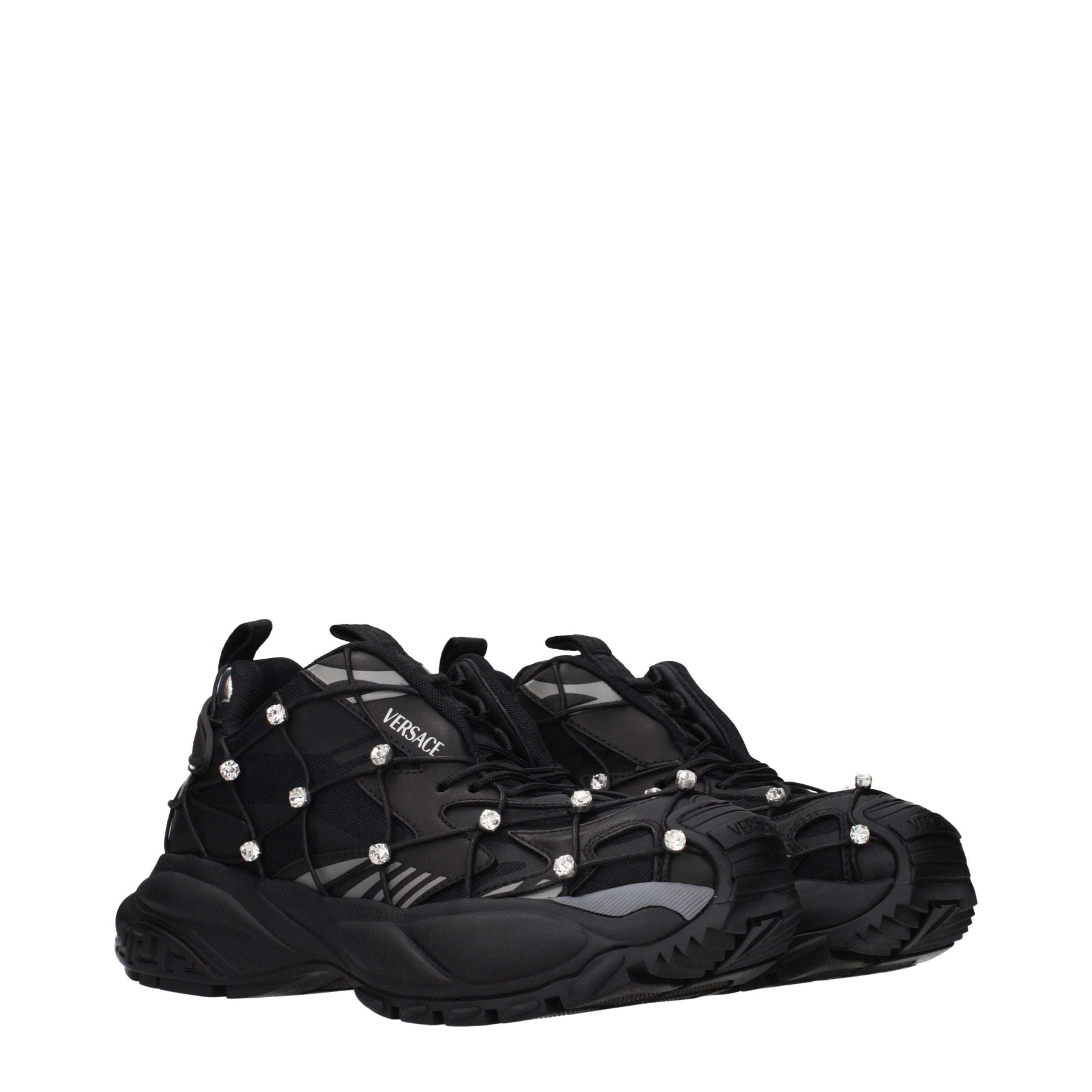 Versace – Sneakers en tissu noir avec logos et strass