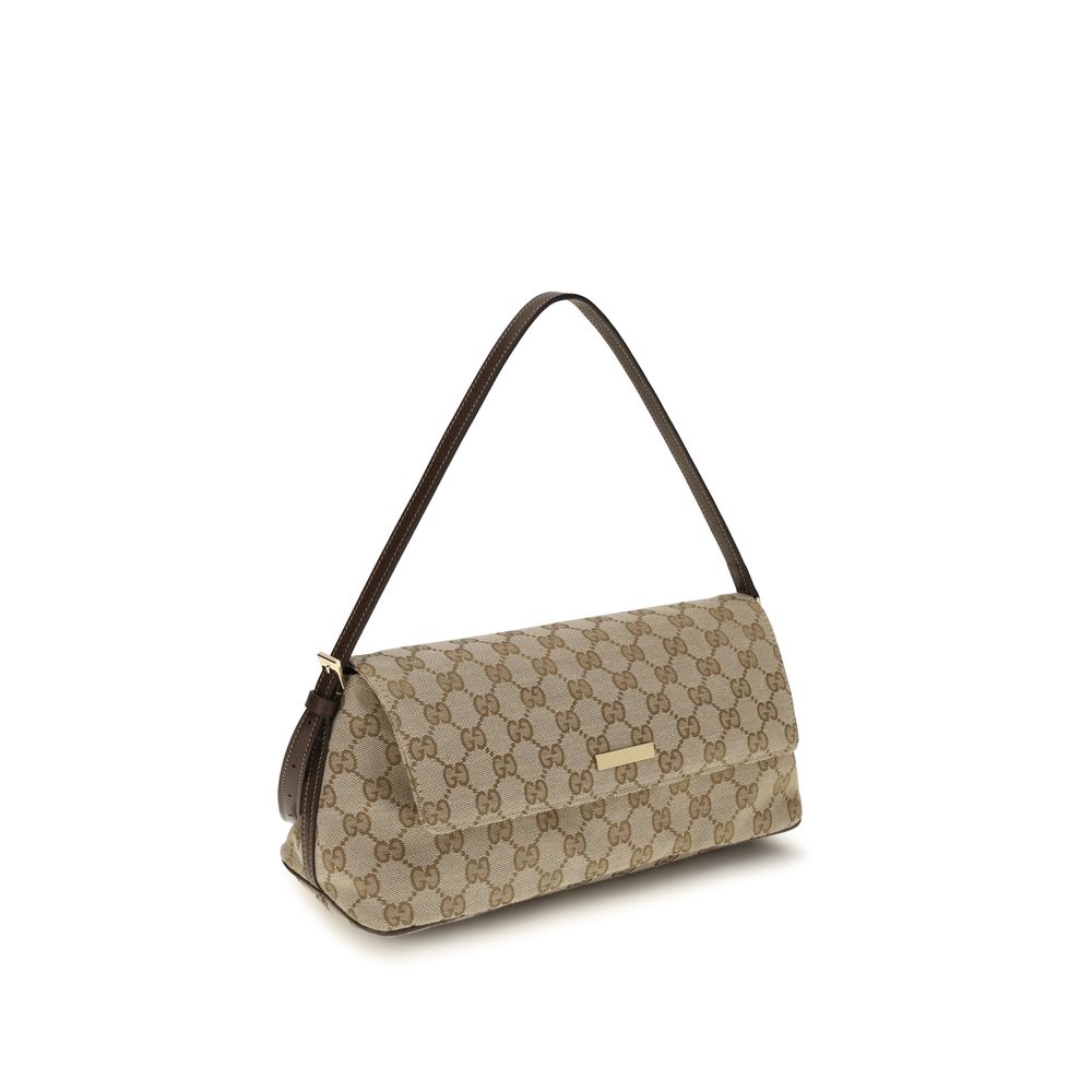Gucci – Sac porté épaule Madison Medium en toile GG