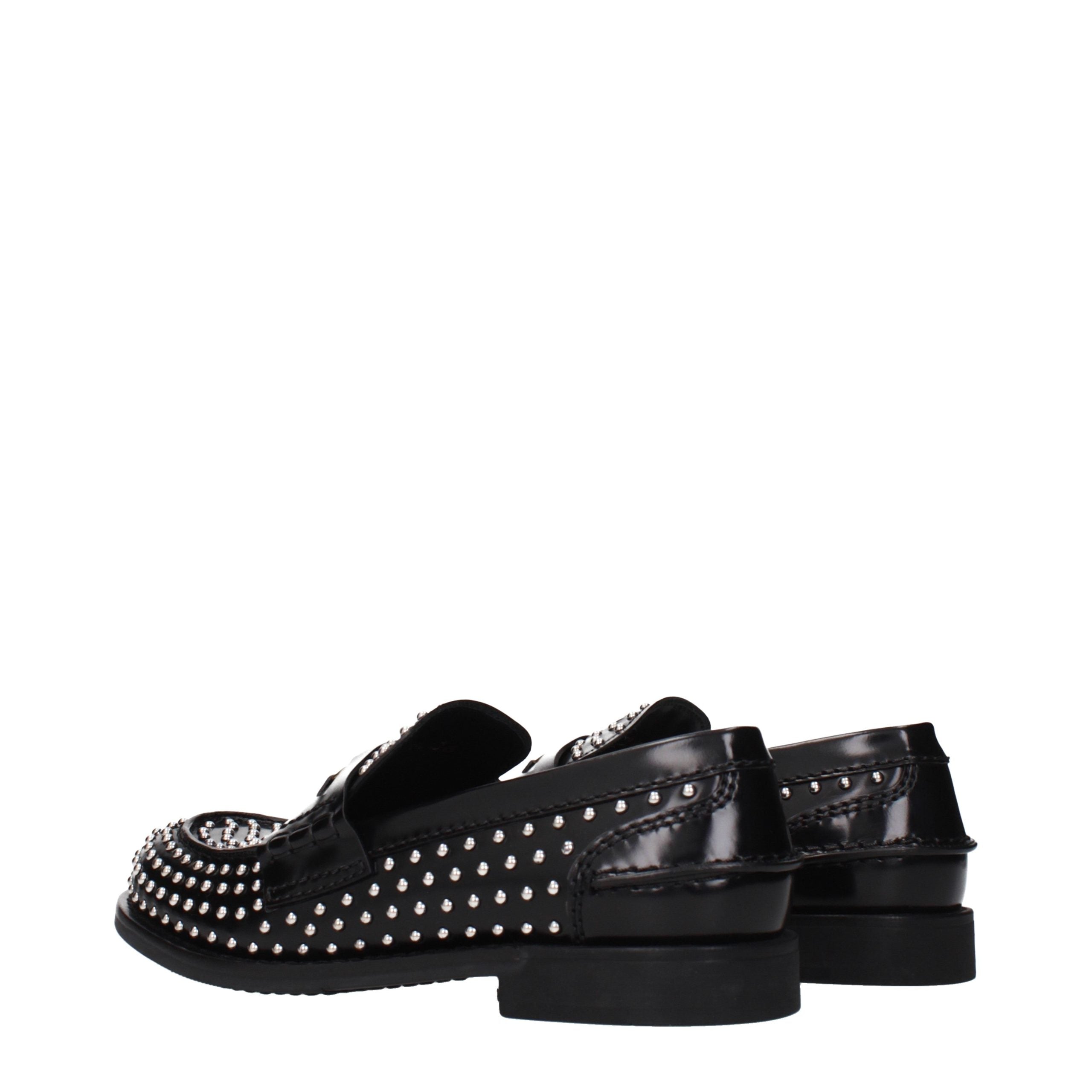Miu Miu – Loafers en cuir noir à clous